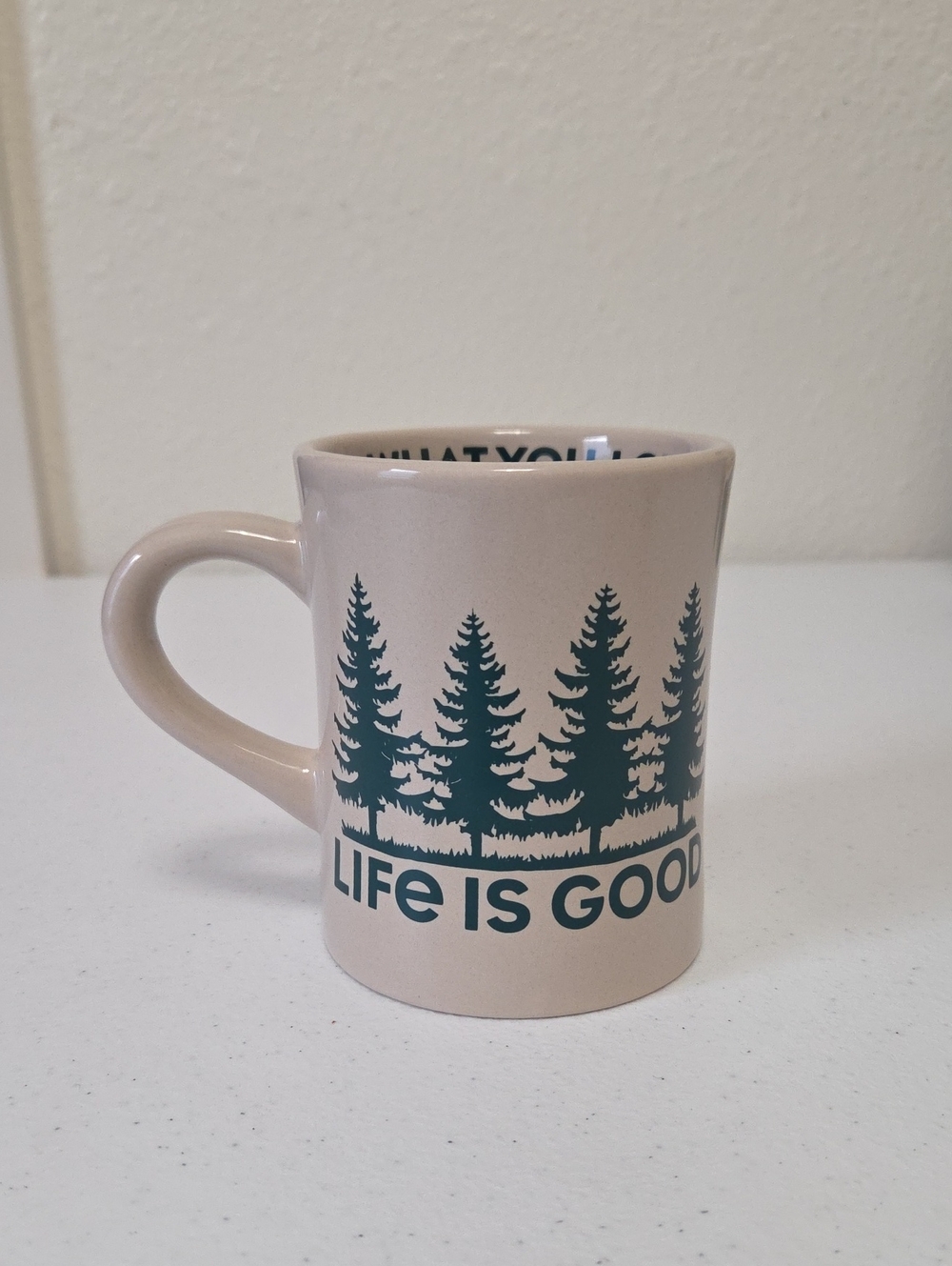 Life Is Good Beige Mug with Forest Green Tree Graphic